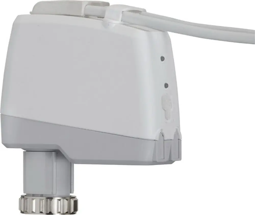 Weißer motorischer Stellantrieb von IMI Hydronic Engineering, mit Anschluss für Regelungs- und Steuerungssystem, sichtbar montiert mit Drehknopf.